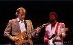 EC and Mark Knopfler of Dire Straits in London in the 1980's - Click me for a full size photo